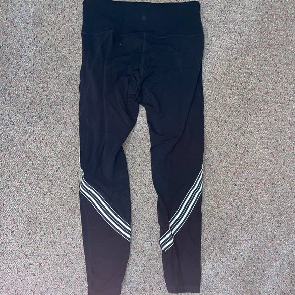Athleta leggings with stripes down side size medium - Picture 2 of 3